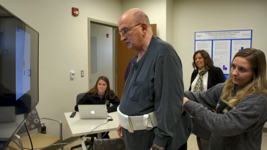Patient Carl Stafford plays a therapy game during a Parkinson's Disease study at Purdue University