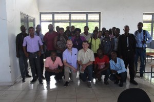 University of Maryland architecture students from Roots Home and Abroad at a community meeting in Leogane Haiti