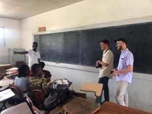 University of Maryland architecture students from Roots Home and Abroad talking with school children at the Leogane School in Haiti