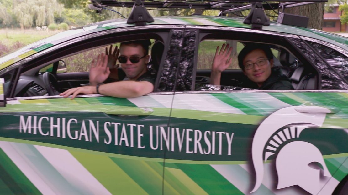 Researchers at Michigan State University take a ride in an autonomous driverless car that they are testing