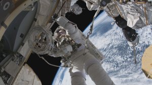 Astronaut and Purdue University alum Andrew Feustel performing a space walk outside the International Space Station.