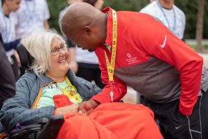 William White greets Jan Deringer Daily ?80, his teammate on Jan?s Fans and a fellow ALS patient, during the September Walk to Defeat ALS in downtown Columbus.