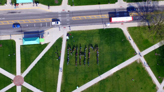 Ohio State University students spell out MHM for Mental Health Matters on the Oval